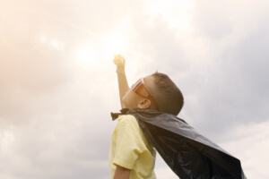 what is early intervention like for little boy in batman cape