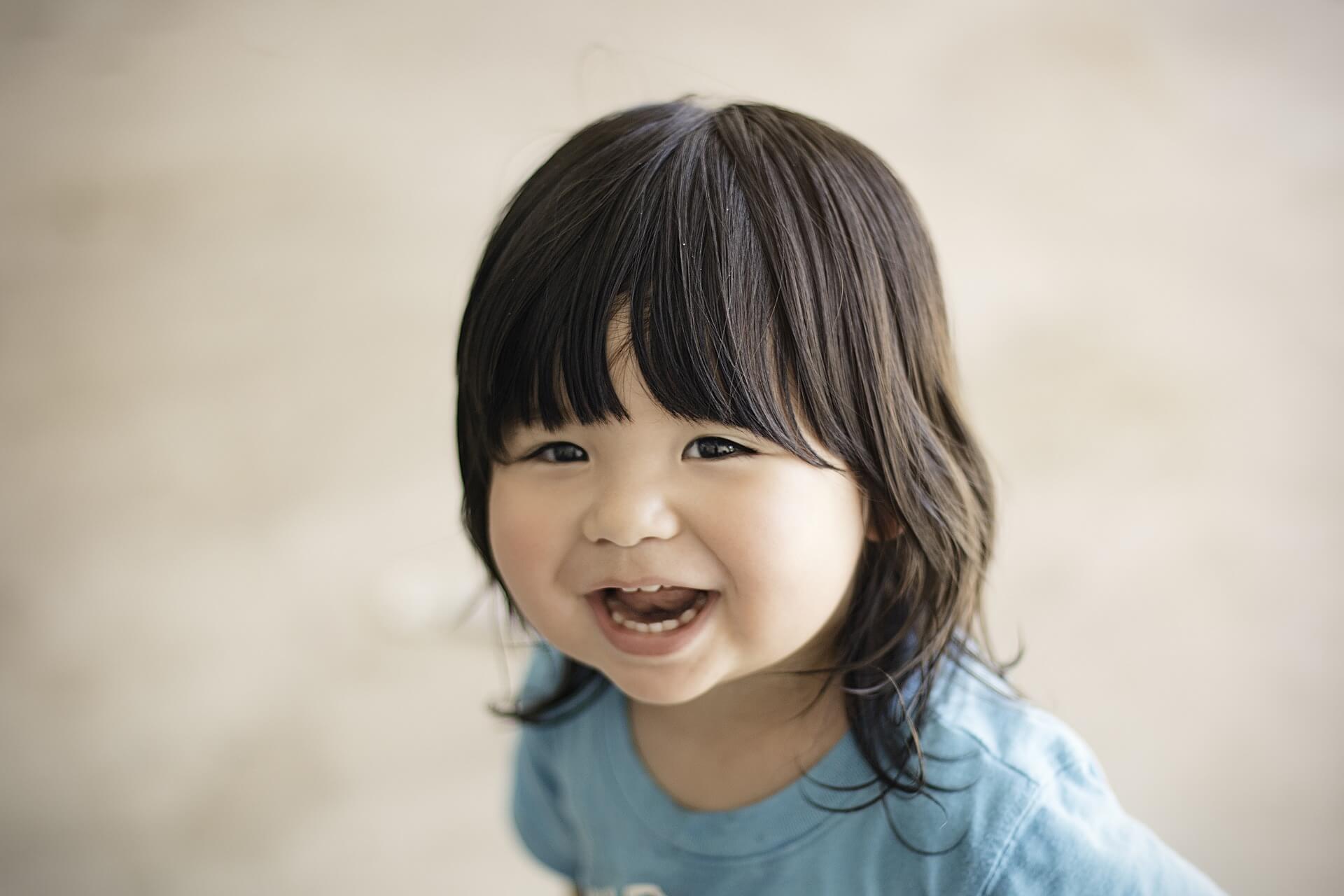 smiling young girl benefits from aba services