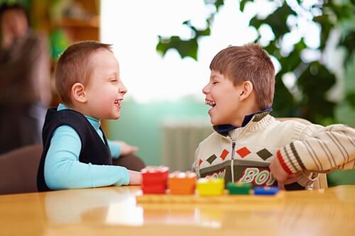 two young boys in early beginnings early intervention program